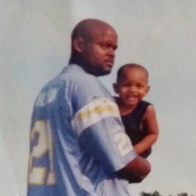 Marqwyn Williams can be seen carrying Maceo Williams.